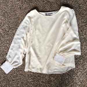 White open sleeved top